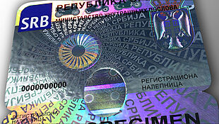 Serbian car windshield label with KINEGRAM Image of Serbian car windshield label with KINEGRAM security feature