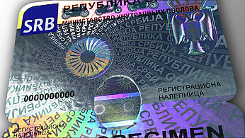 Serbian car windshield label with KINEGRAM Image of Serbian car windshield label with KINEGRAM security feature