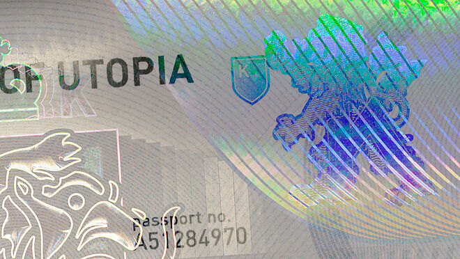 Close-Up of a KINEGRAM security elemen on a sample card with High Definition Metallization HDM, in a lion crest shape